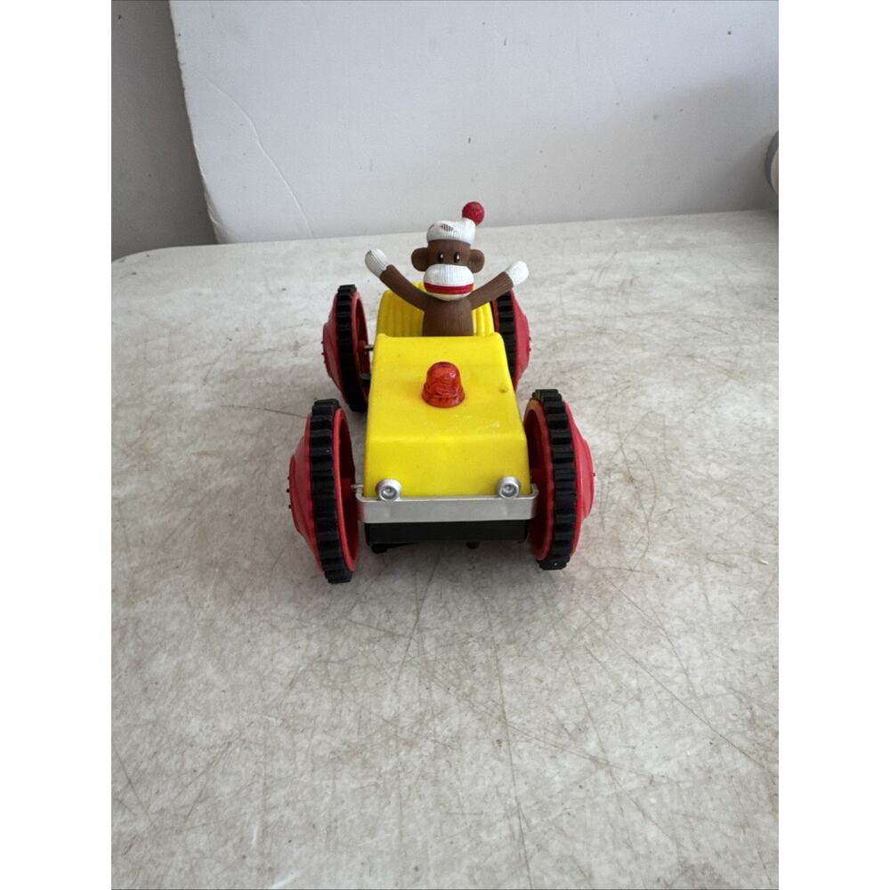 Sock Monkey Yellow Tumbling Toy Battery Operated Car